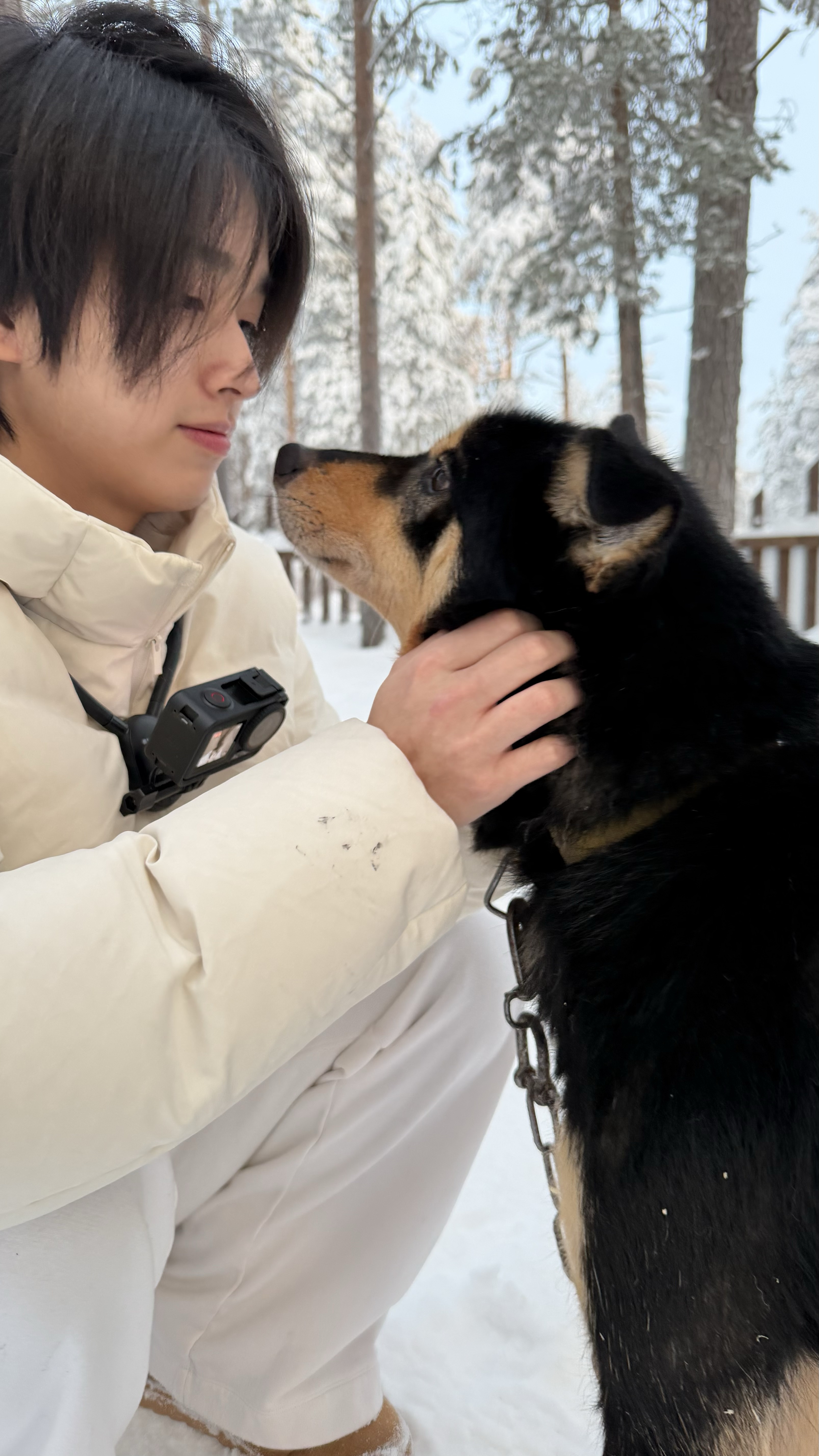 Lok Hang Liang outdoors with his dog